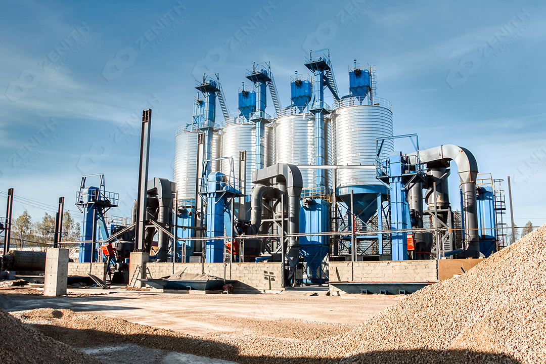 Operator adjusting grinding mill parameters from control panel