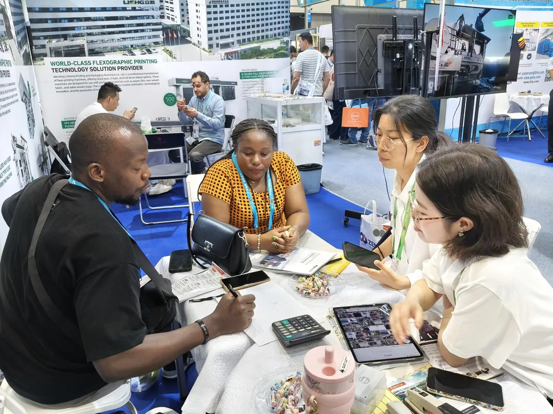 Discussion at the ZENITH booth with a customer