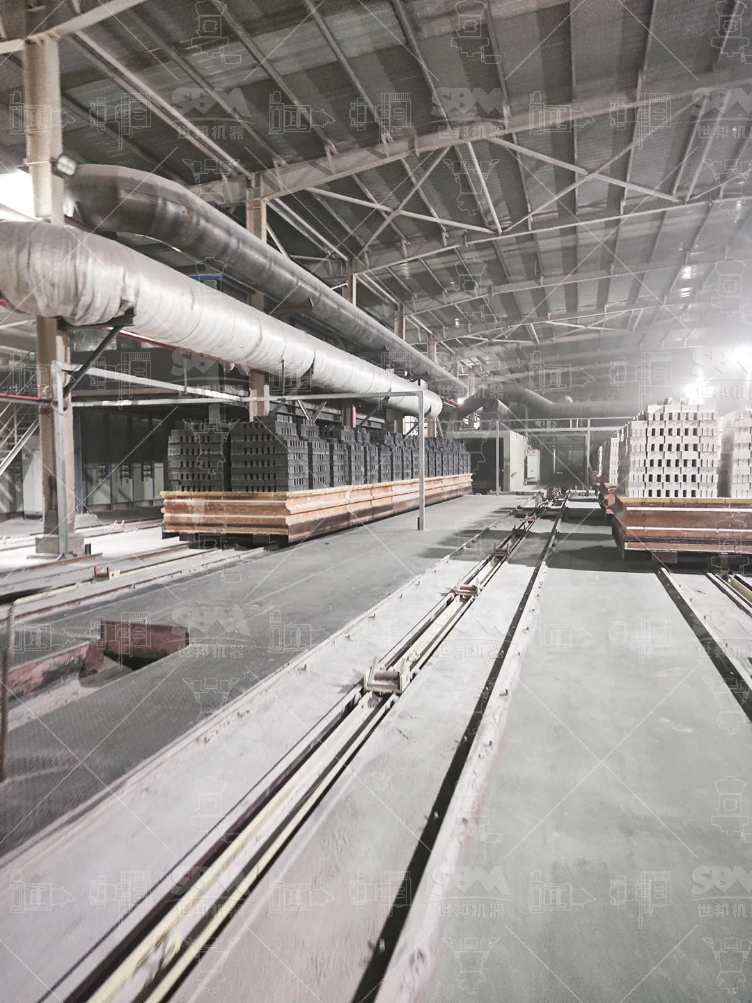 Tunnel kiln hall with loaded kiln cars at the coal gangue resource utilization plant