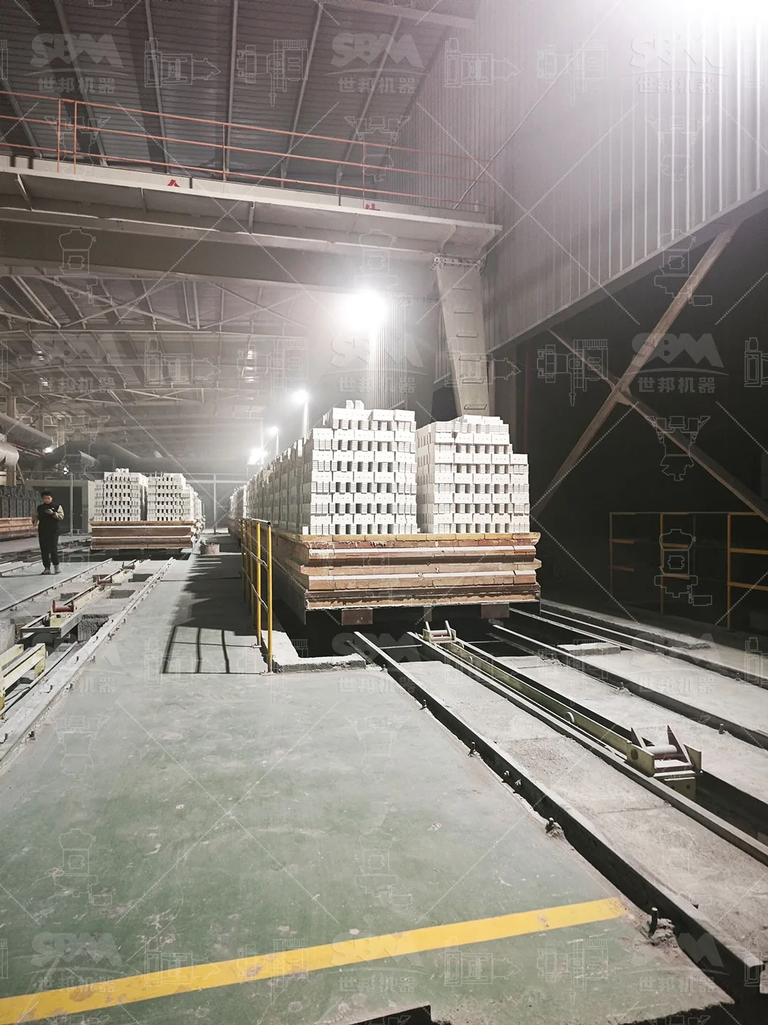 Kiln cars with finished refractory products in the firing hall