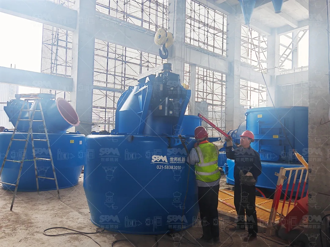 Installation crew guiding an MTW178G mill body under the overhead crane during erection in Jinan