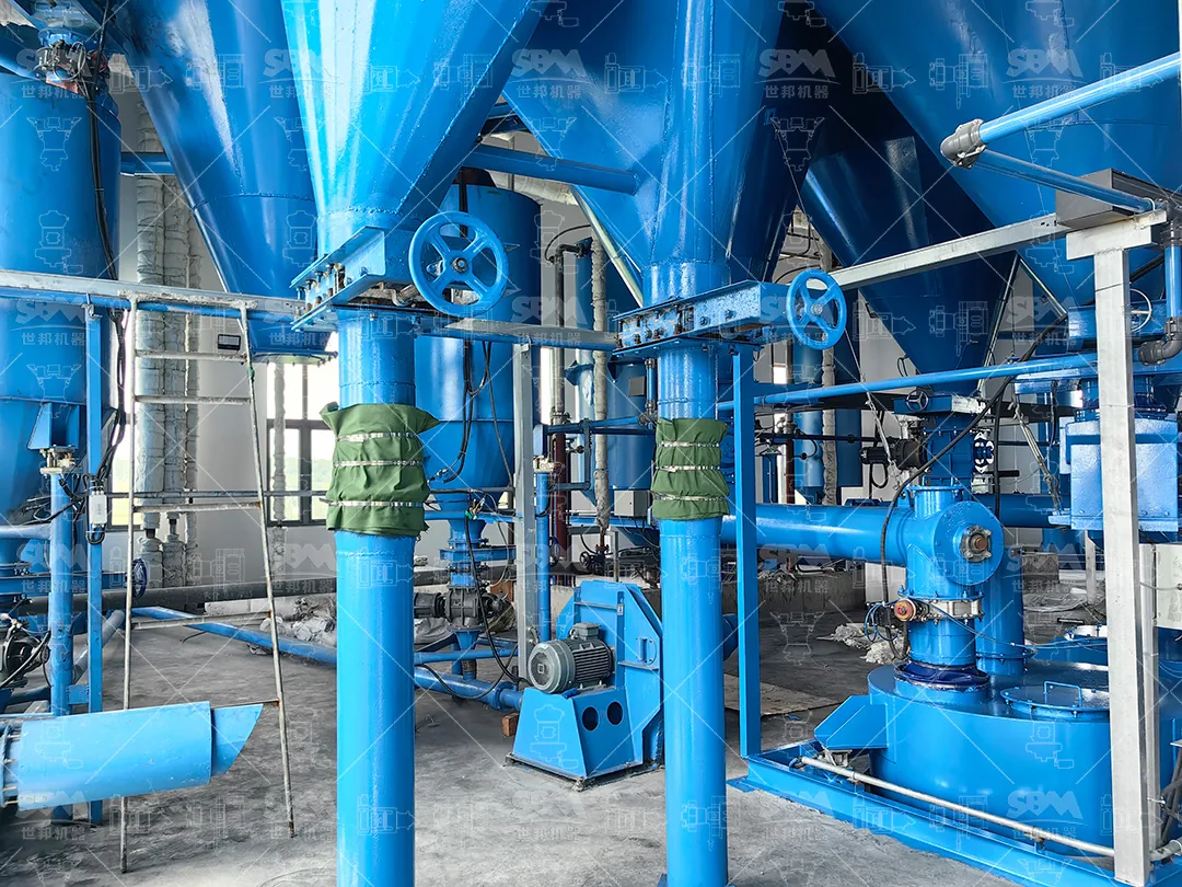Mill outlet piping and pneumatic valves on the calcined petroleum coke grinding circuit
